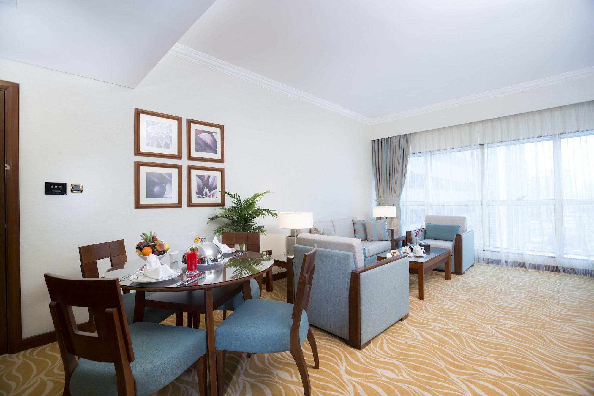 Grand Mercure Majlis Residences Abu Dhabi Exteriör bild A living room at the hotel