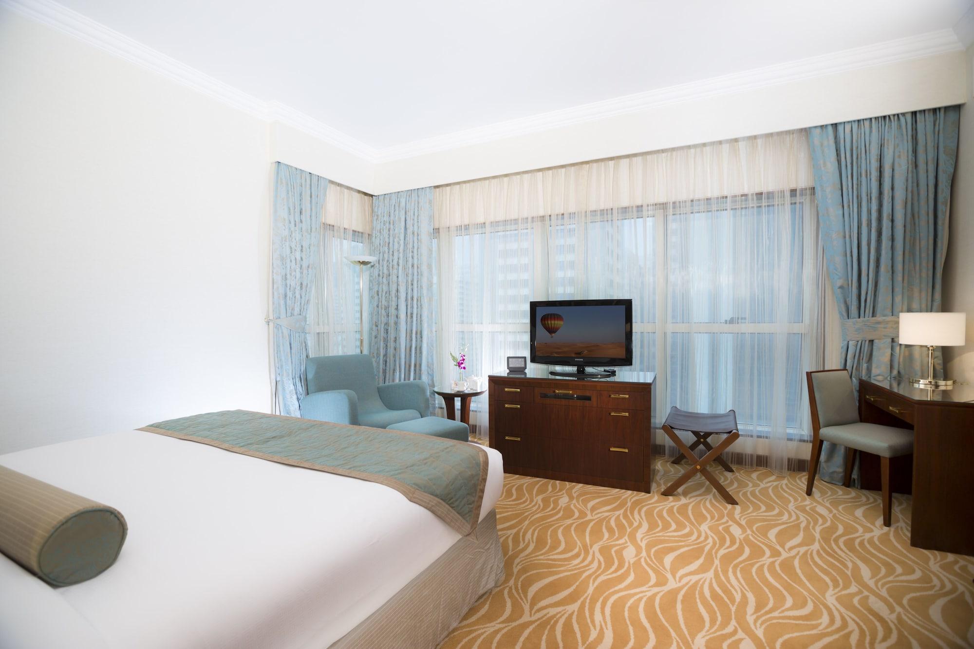 Grand Mercure Majlis Residences Abu Dhabi Exteriör bild A room at the hotel