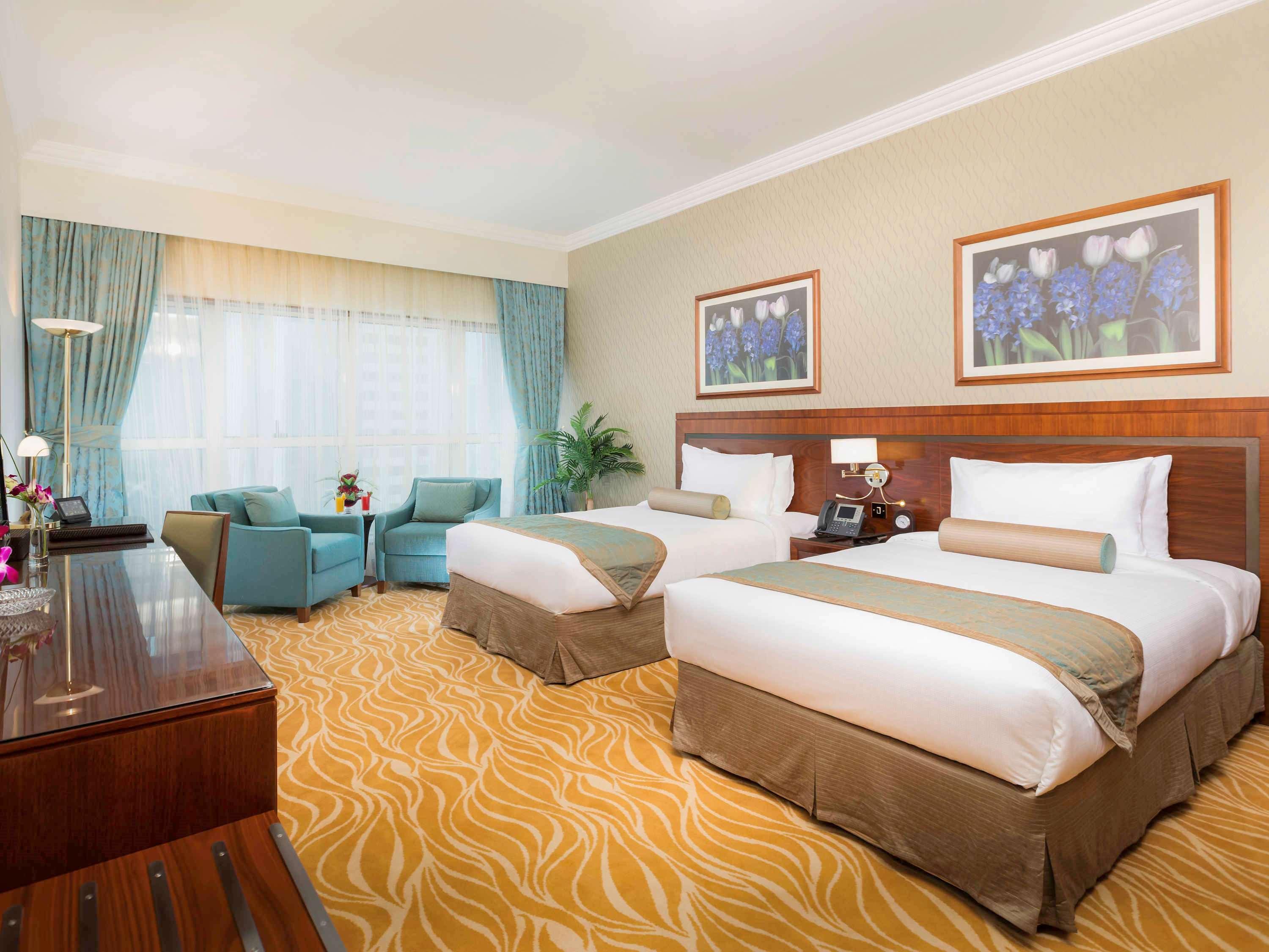 Grand Mercure Majlis Residences Abu Dhabi Exteriör bild A room at the hotel